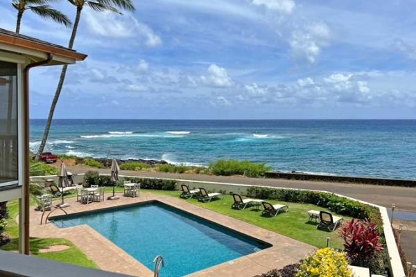 Alihi Lani unit 4 lanai view across heated pool to ocean