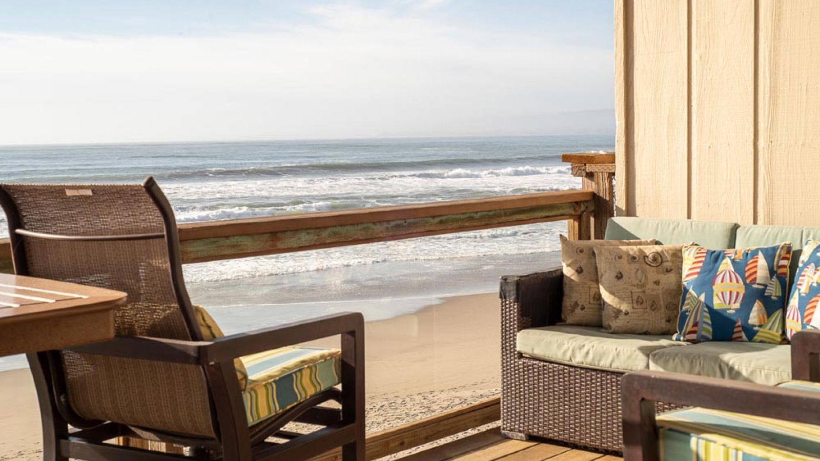 cozy outdoor deck next to beach is perfect vacation getaway