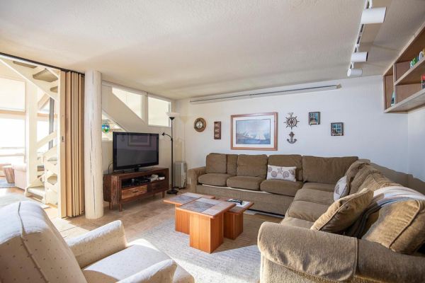 cozy beach house family entertainment room doubles as extra sleeping space